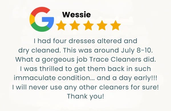 Google review by Wessie with five gold stars, praising Trace Cleaners for excellent and early dress alterations and dry cleaning, vowing to use only their services in the future.